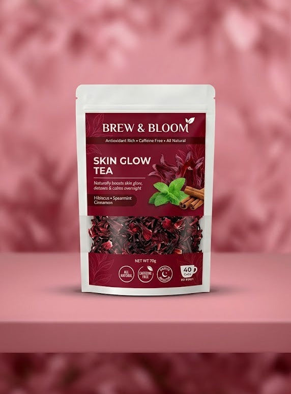 Brew & Bloom Skin Glow Tea package on a pink background