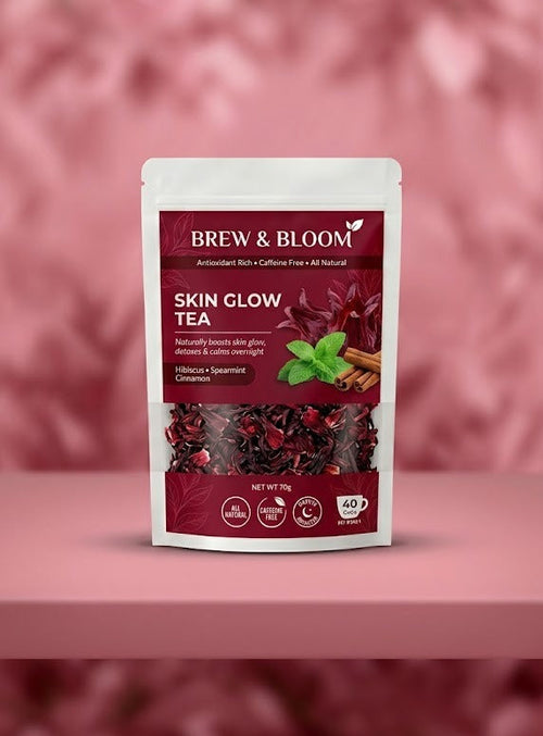 Brew & Bloom Skin Glow Tea package on a pink background